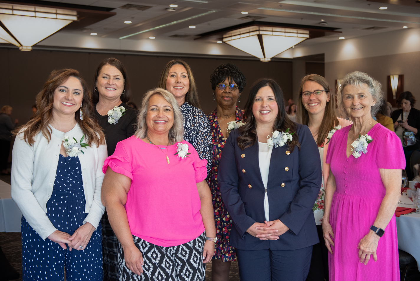 group shot of women with corsages